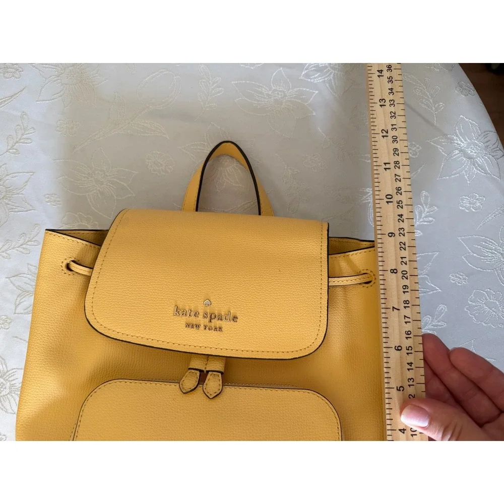 Kate Spade New York Yellow Pebbled Leather Drawstring Backpack Bag